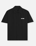 WYND black 100% cotton oversized short-sleeve shirt with a crisp weave and white logo detail.